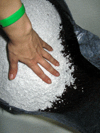 A moving gif showing the perlite being mixed in